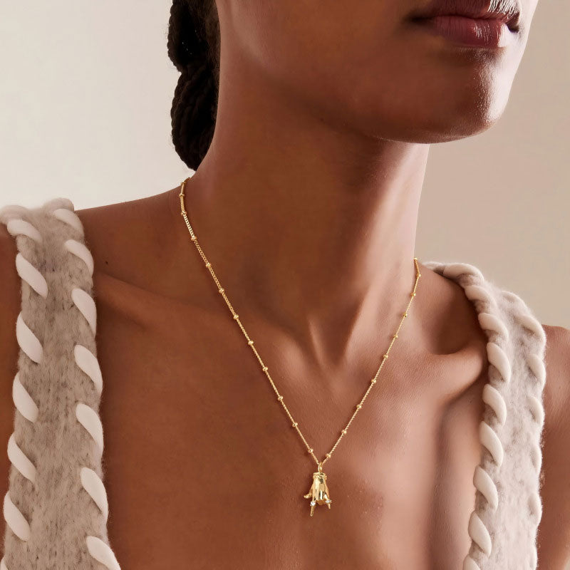 Gold Hand Gesture Pendant Necklace